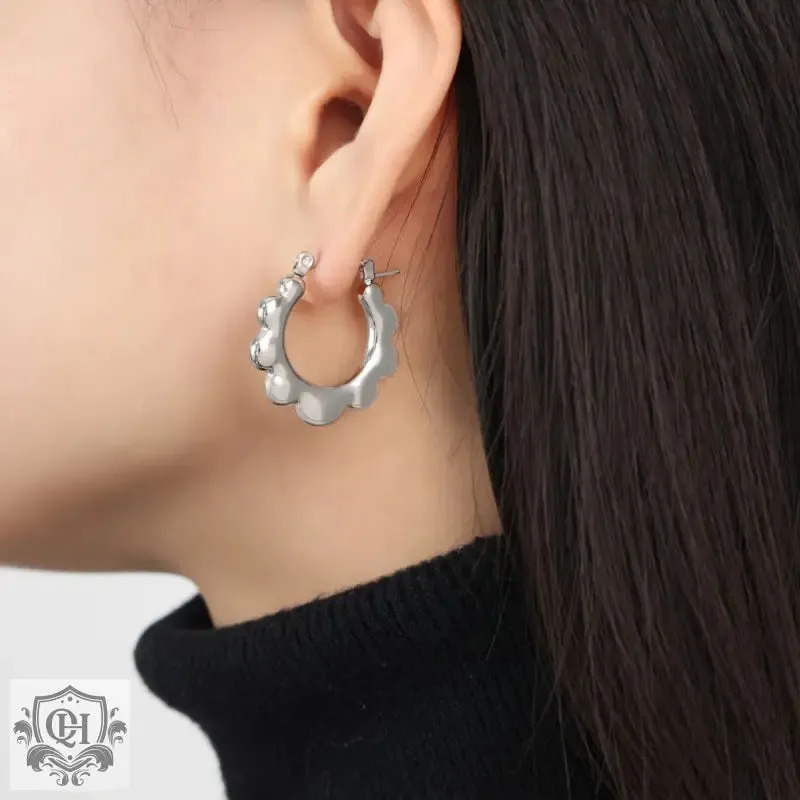 18K gold stylish simple U-shaped earrings with sunflower design
