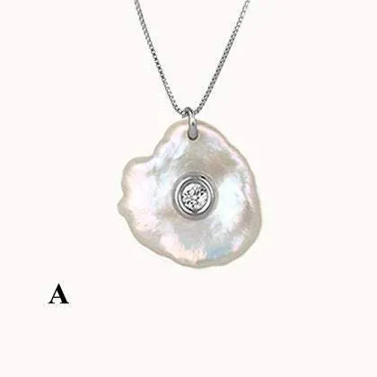 Clams. Mother of Diamond Silver Pendant