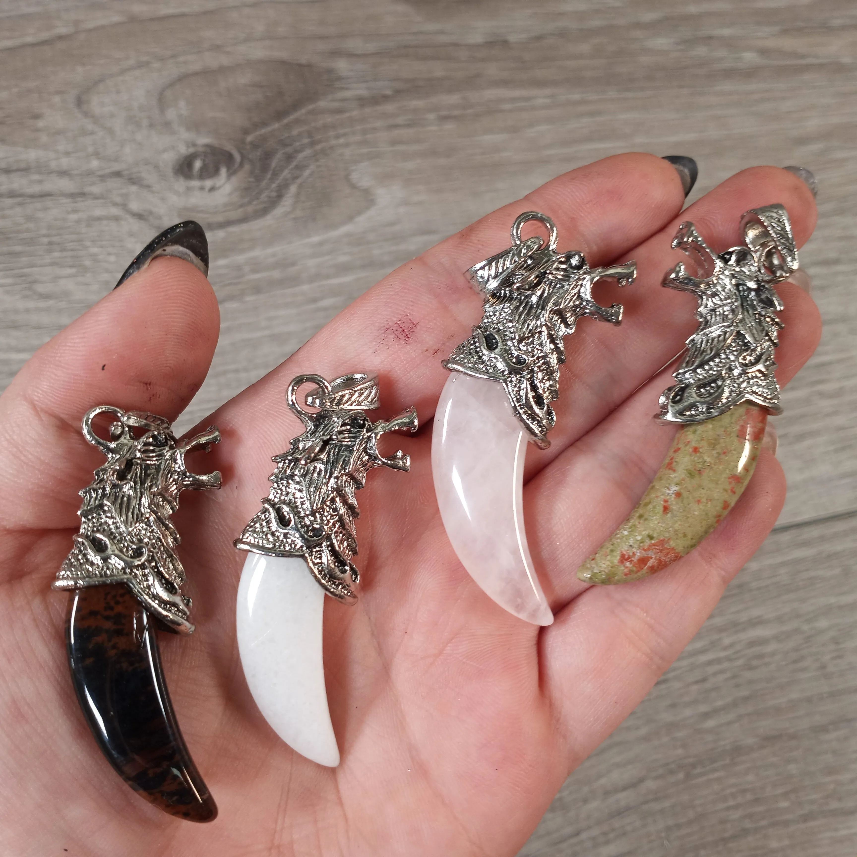 Hand-Carved Gemstone Wolf Head Pendant – Assorted Stones
