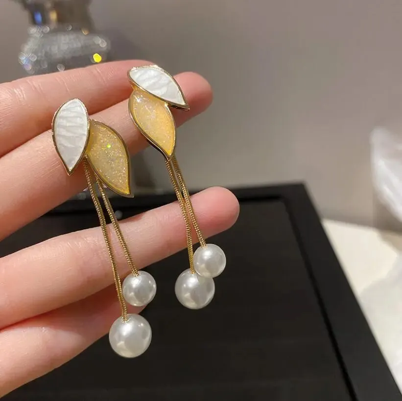 Lady Glams Elevate Your Style with the 2024 New Fashion Trend Pearl Leaf Tassel Earrings