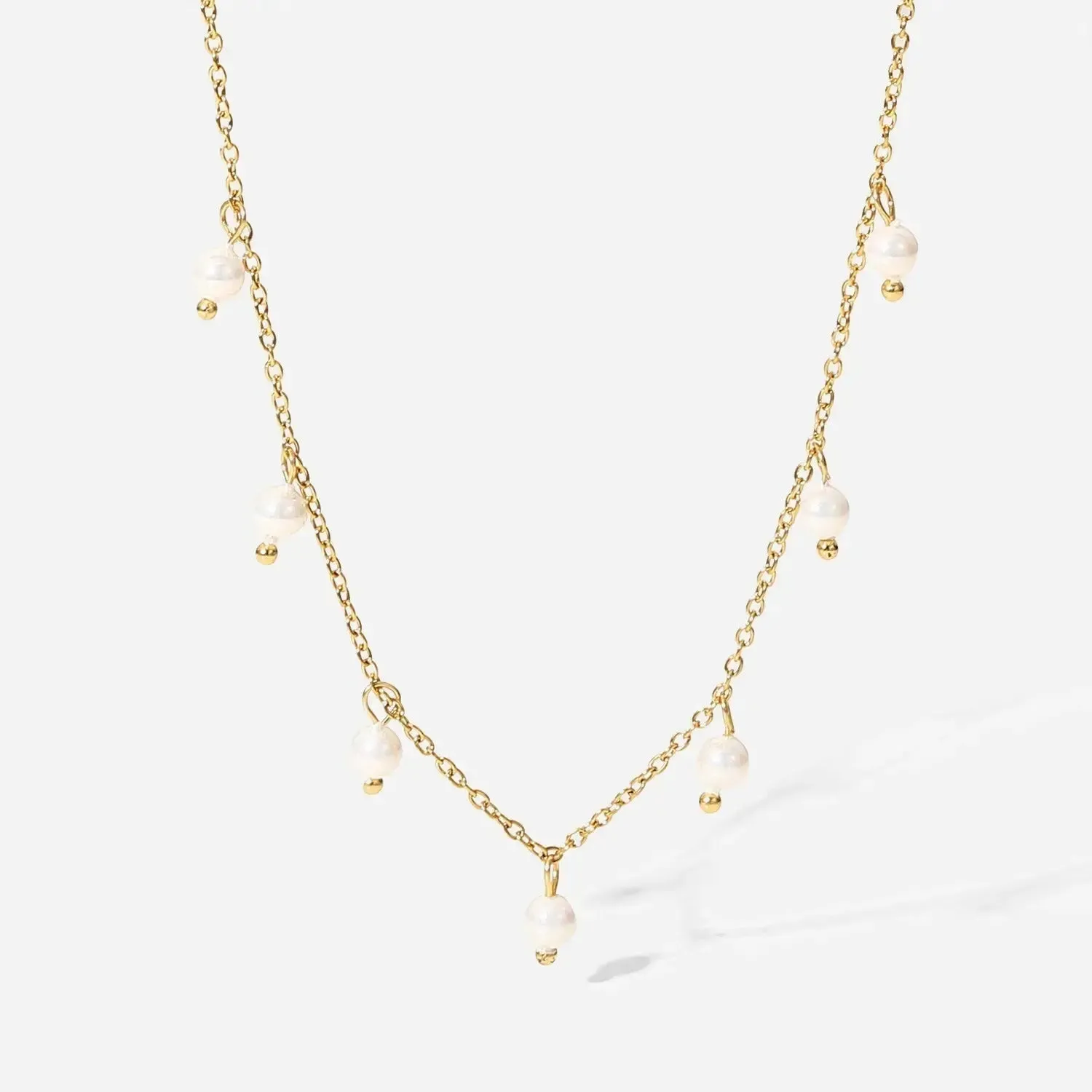 LOVCIA Opulent Elegance Pearl Tassel Necklace - Women's Gold Plated Stainless Steel Chain