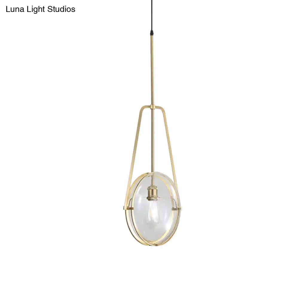 Modern Brass Pendant Light with Clear Glass Shade and Unique Halberd Frame