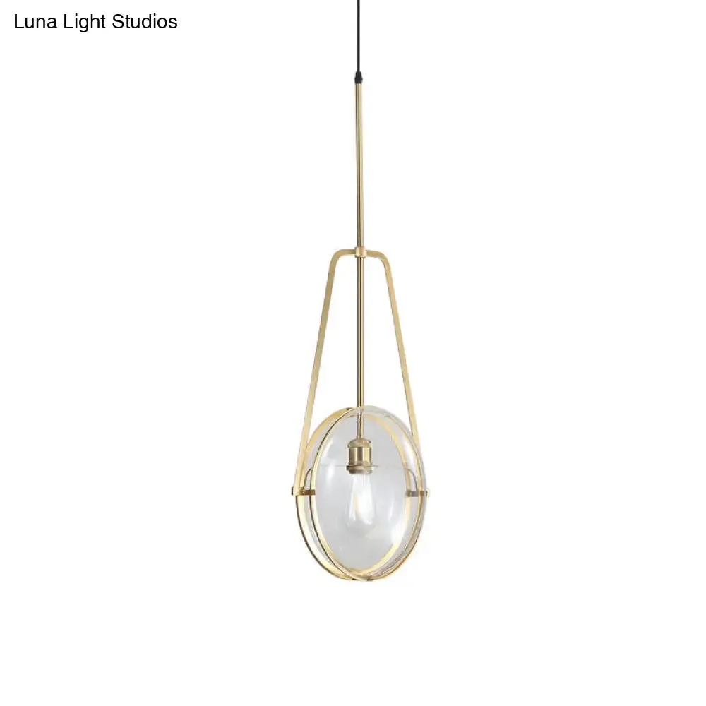 Modern Brass Pendant Light with Clear Glass Shade and Unique Halberd Frame