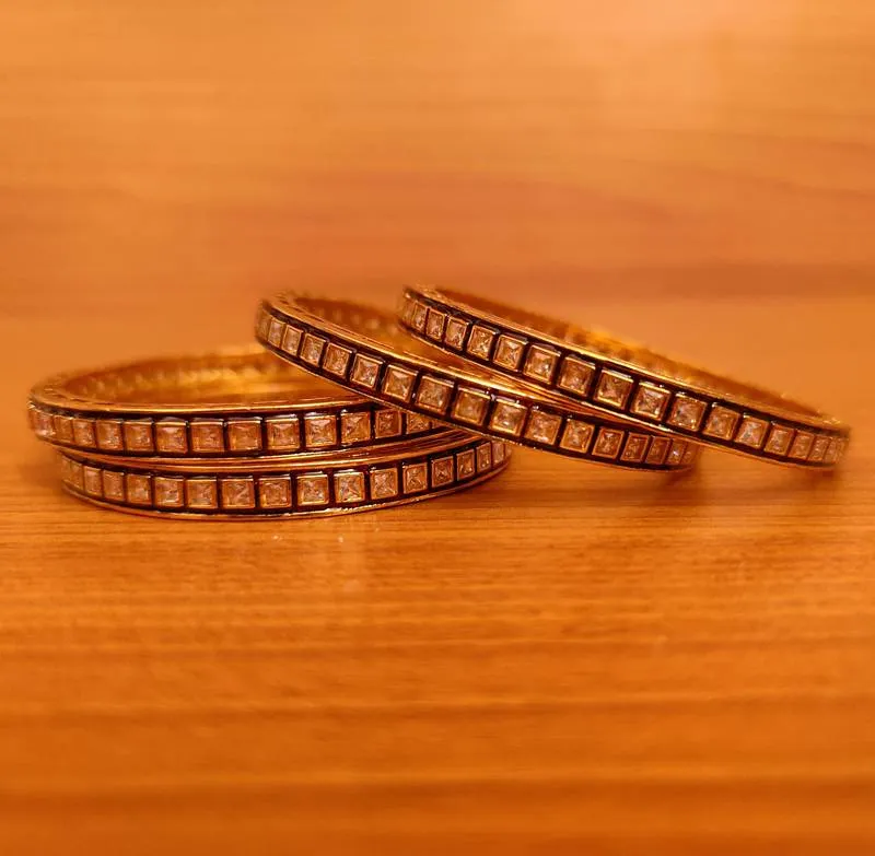 RED MEENAKARI POLKI STUDDED SET OF 4 BANGLES