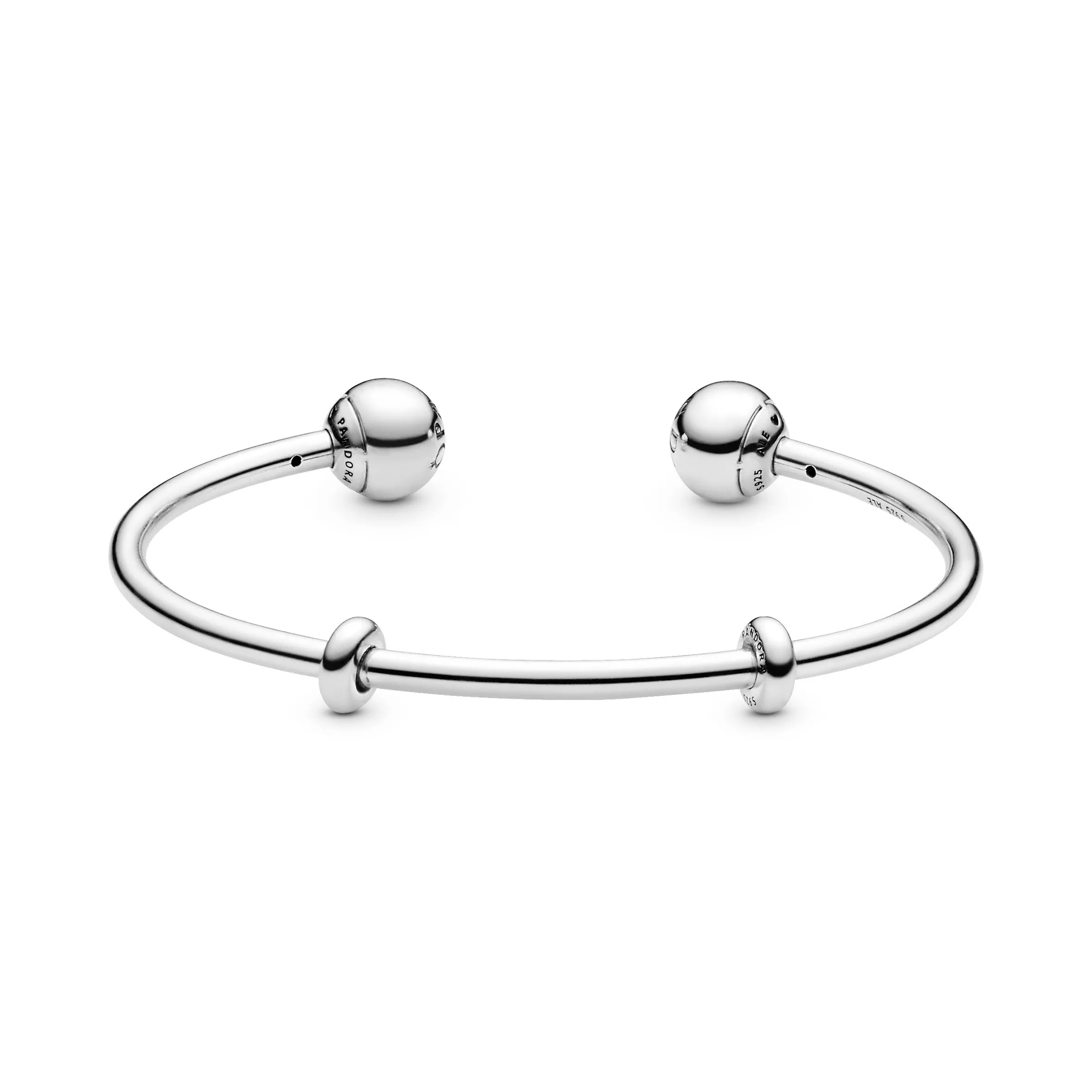 Silver open bangle with silicone stoppers and interchangeable end caps