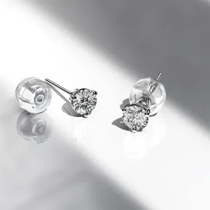 Timeless Solitaire Stud Diamond Earrings Encased in 18k White Gold